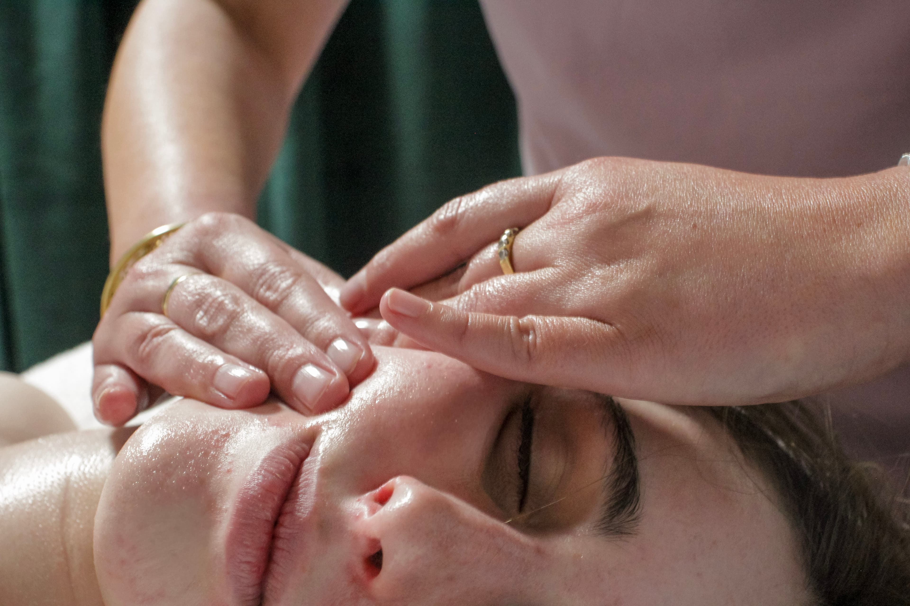 A facial massage at Rise Medi Spa